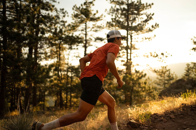 runner running in woods