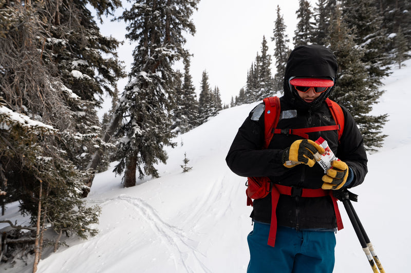 skier eating a snack