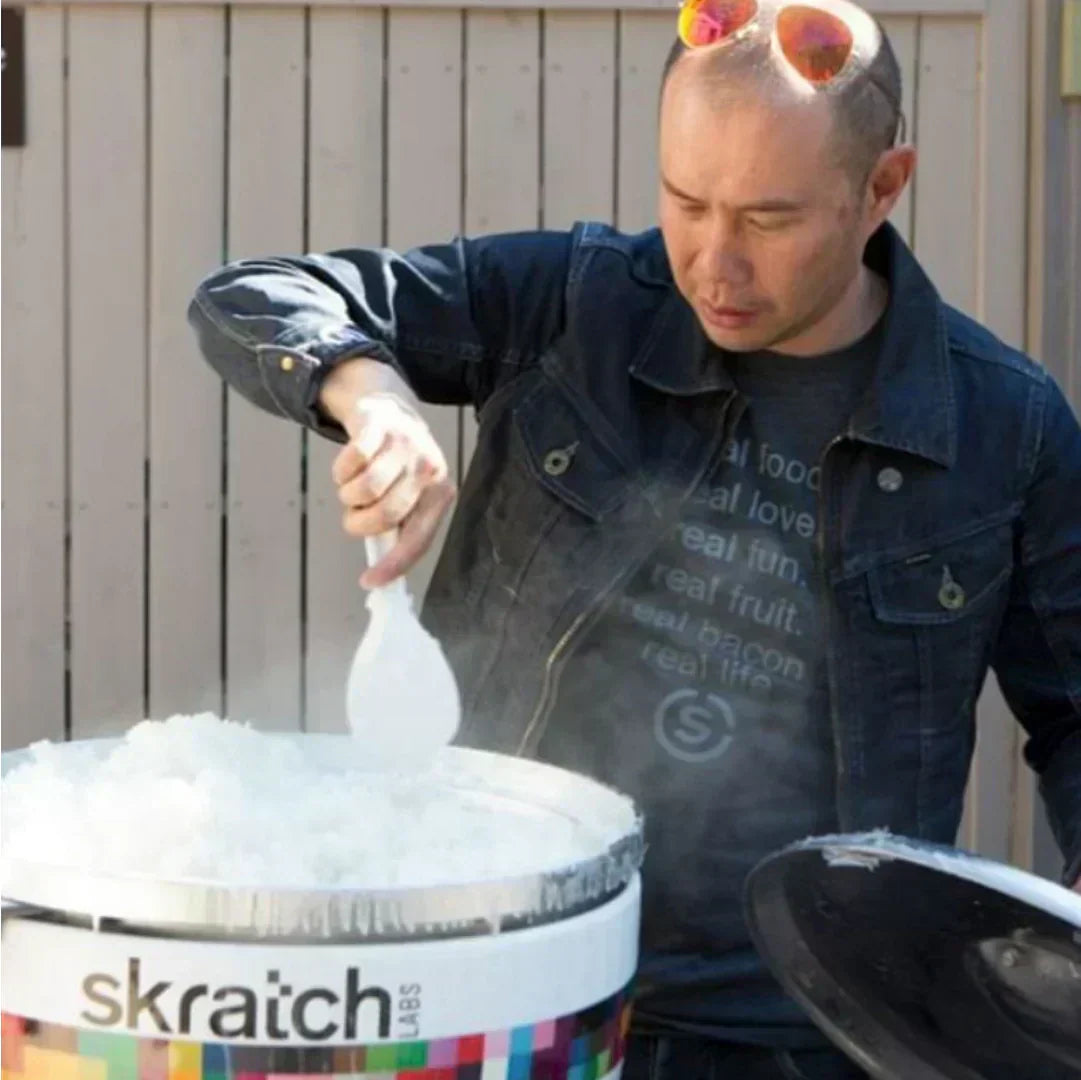 allen lim stirring a pot of rice