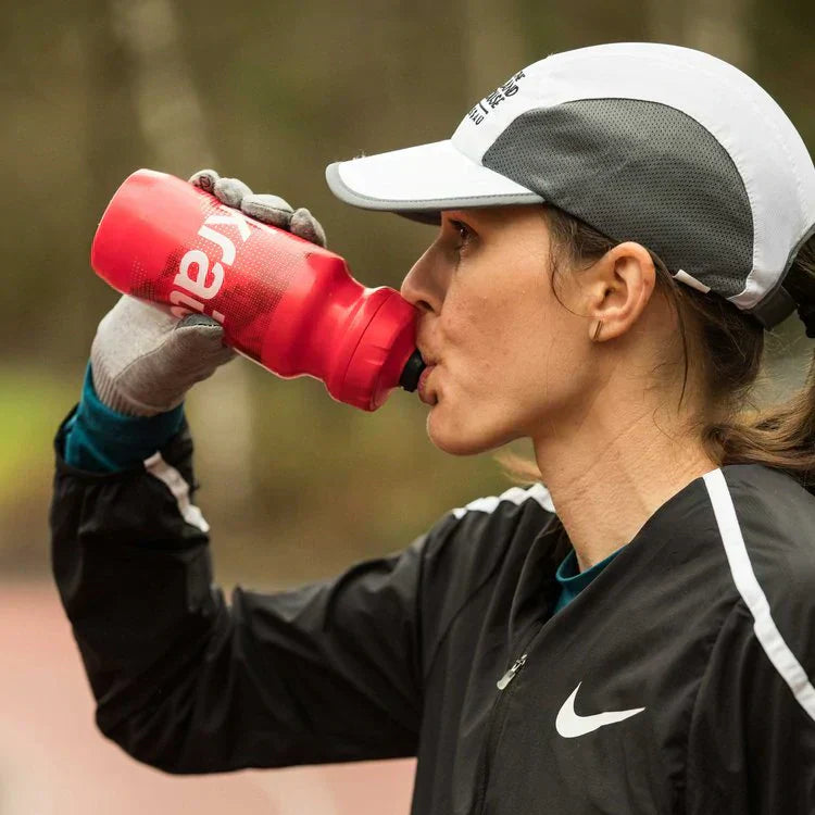 runner drinking from bottle