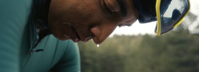 cyclist resting and sweating