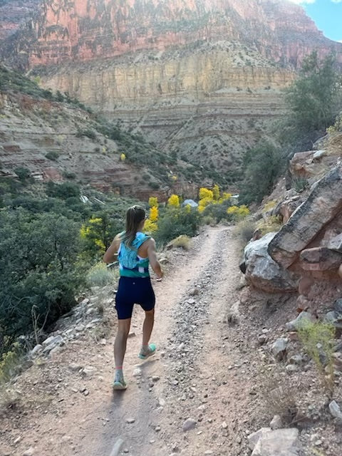 female runner on a trail run