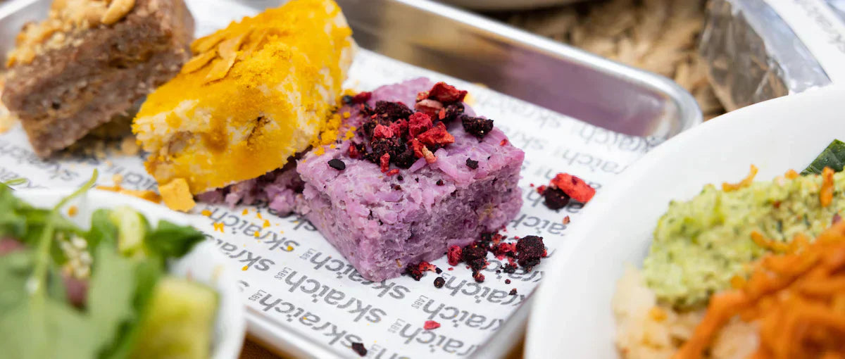 3 colorful rice cakes on a plate